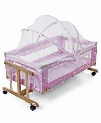 wooden cradle with mosquito net