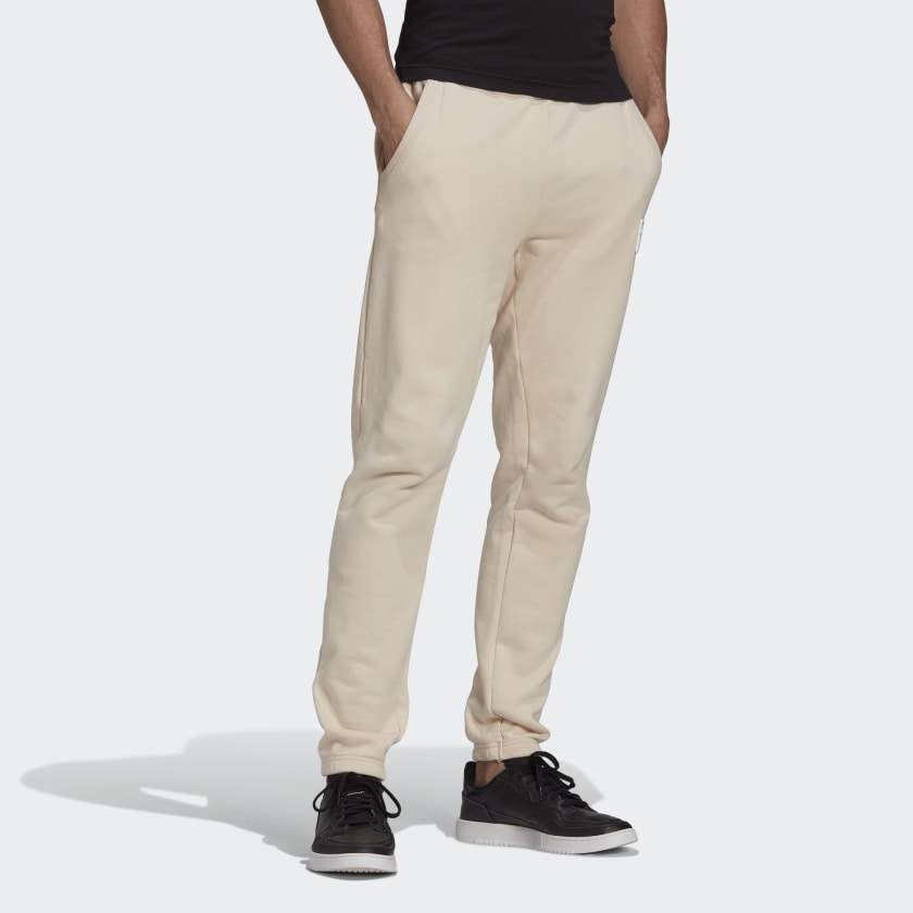 Adidas GN3301 R.Y.V. Silicone Double Linear Badge Joggers (Halo Ivory) in  Delhi at best price by Brand Story - Justdial