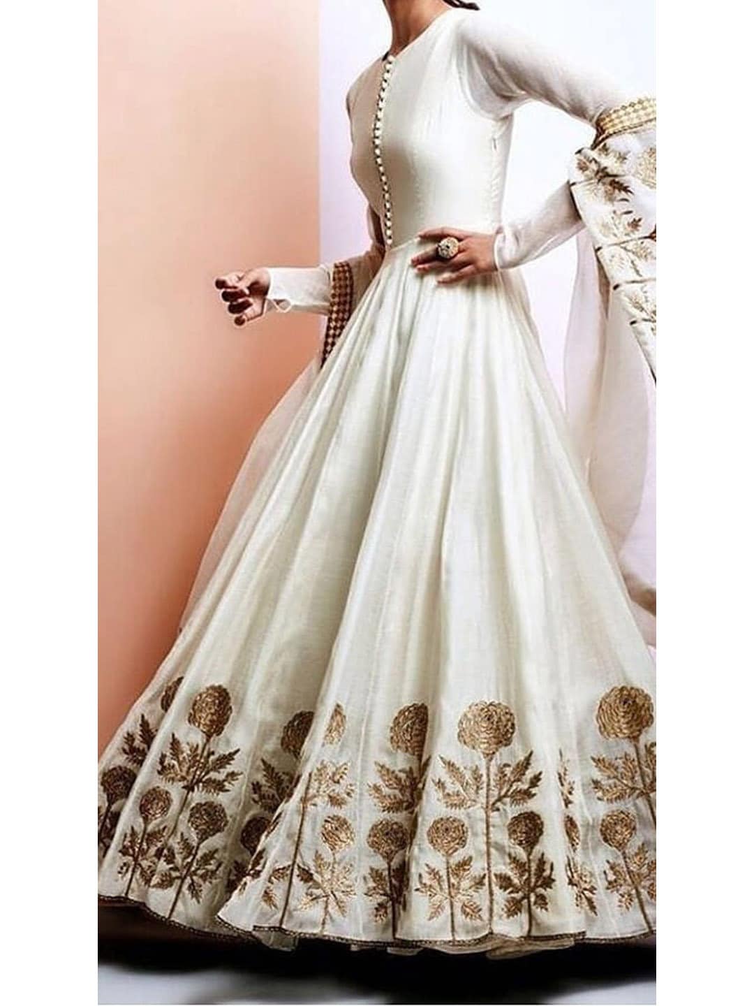 white anarkali dress buy ahmedabad Ivory elegance with timeless gold detailing This embroidered suit with delicate dupatta is perfect for pujas, family functions & intimate wedding celebrations. Light, graceful & effortlessly royal. Available in-store & Intricate thread and sequin work on kurta Zeenat White Embroidered Anarkali Set