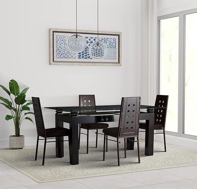 Laura James Glass Dining Table And Black Chairs Laura James Dining