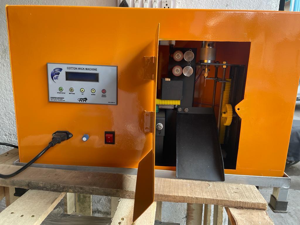 https://images.jdmagicbox.com/quickquotes/images_main/fully-automatic-raund-cotton-wick-making-machine-2217528854-w4eui59h.jpg
