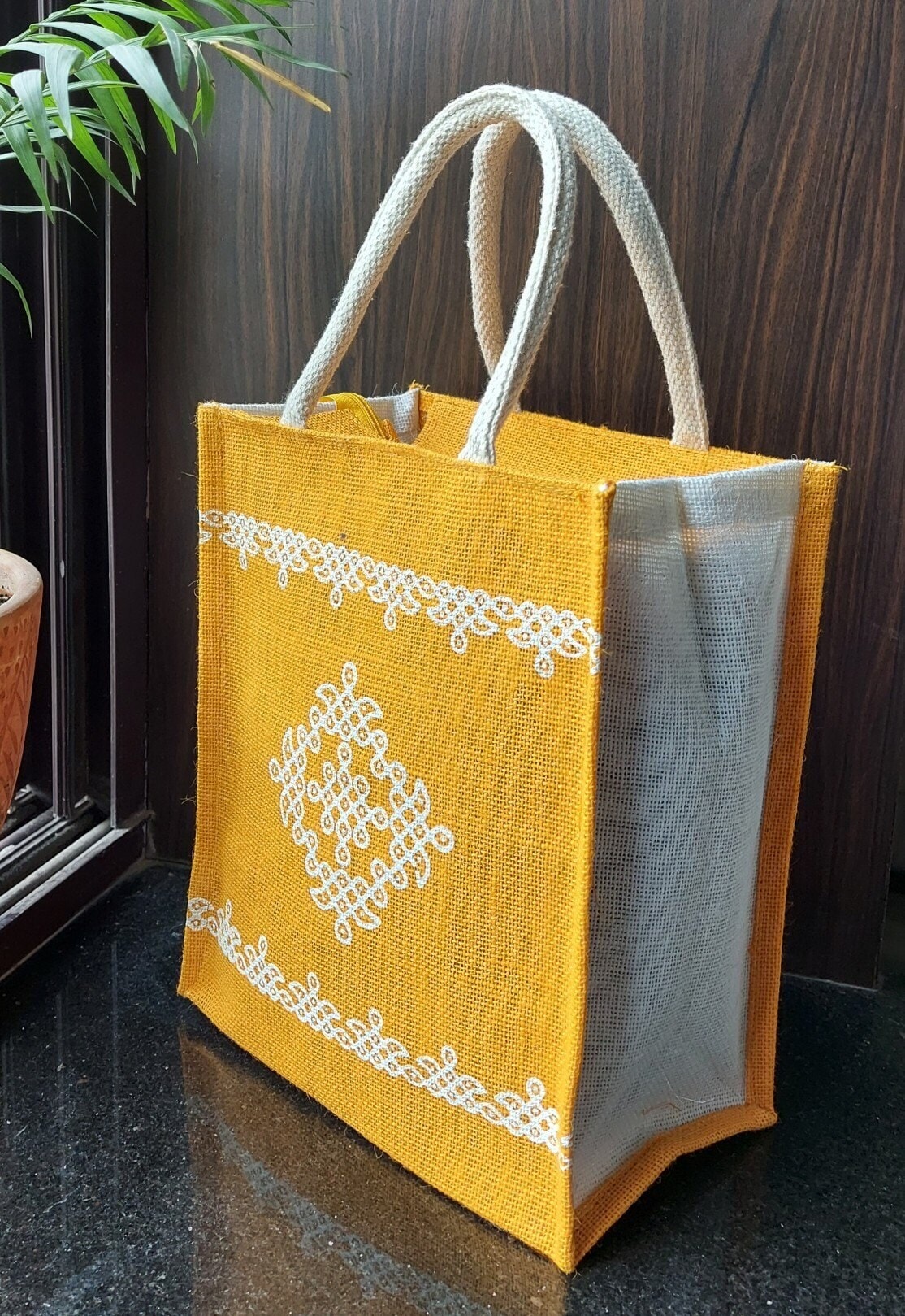 Kolam Jute Yellow Printed Bag with Zipper Closure and Loop Handle