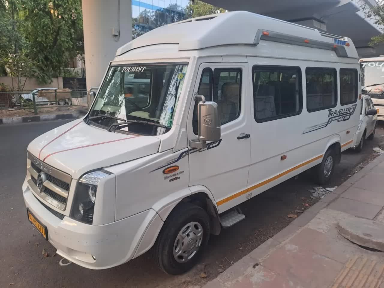 Premium white AC Tempo Traveller exterior for group travel