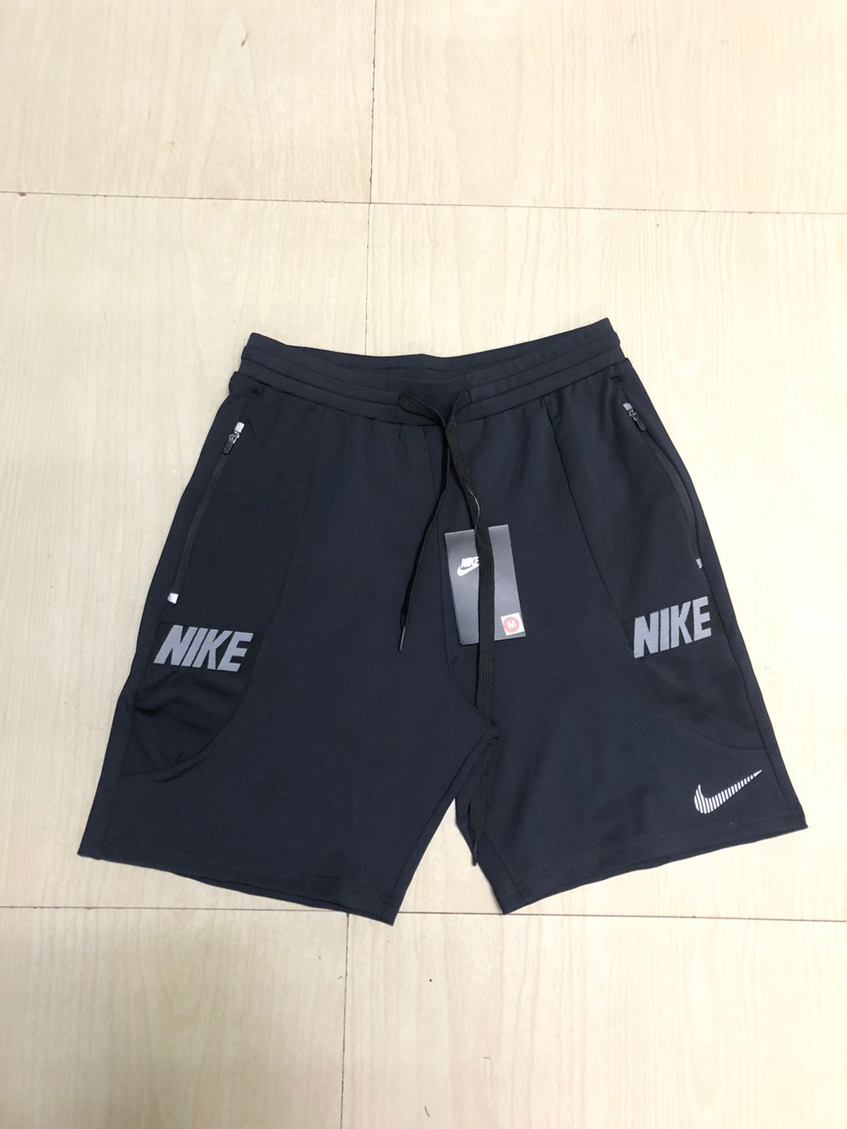 black nike nylon shorts