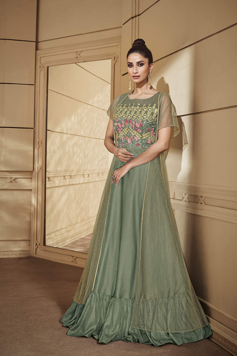 Roopmilan Turquoise Gown With Net Overlay in Cuttack at 9 861 10 490 by Narayani collections Justdial